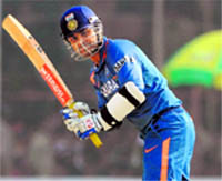Virender Sehwag plays a shot during his century innings on the first One-Day International in Rajkot on Tuesday.