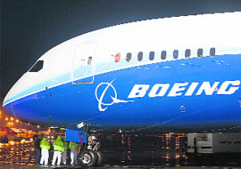 A Boeing 787 Dreamliner is seen after its first flight at Boeing Field in Seattle, Washington, on Tuesday. The much-delayed Dreamliner is made of a plastic composite material that can save up to 20 per cent in fuel costs.
