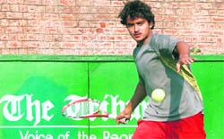 A player in action during the AITA Talent Series Tournament in Chandigarh on Wednesday. 