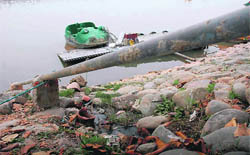 Stinking water flows unabated as stench troubles visitors at Sukhna Lake.