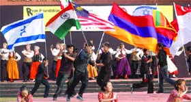 Children from different countries with their national flags on the opening ceremony of 10th International Children's Festival of Performing Arts, 2009 at National Bal Bhawan in New Delhi