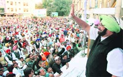 Capt Amarinder Singh waves to the crowd in Bathinda