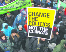 Protesters march towards the Bella Centre during a demonstration in Copenhagen on Wednesday. 