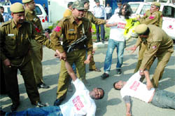 Greenpeace activists protest outside the US embassy in New Delhi on Thursday.