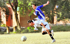 A match of the MK Bisht Memorial Football Tournament being played at FRI Club Grounds in Dehradun on Thursday.
