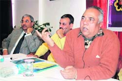 Buddhinath Mishra, a Hindi poet, addresses the media in Dehradun