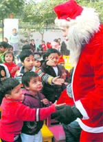 Students of St Stephens Preparatory School celebrate Christmas in Chandigarh on Friday.