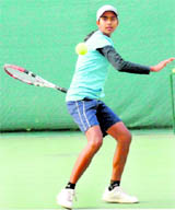 Nikita in action during a tennis match in Chandigarh on Friday.