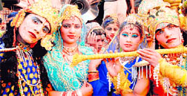 Artistes dressed as Radha and Krishna at a religious procession in Haridwar on Friday. Tribune photo: Rameshwar Gaud