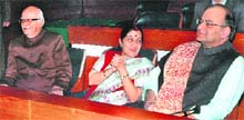 BJP leaders LK Advani, Sushma Swaraj and Arun Jaitley inside Parliament on Friday. 