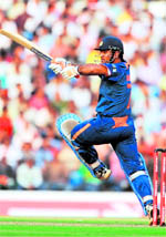 MS Dhoni bats against Sri Lanka during the second ODI in Nagpur on Friday.  AFP