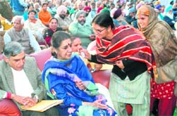 Union Minister of Information and Broadcasting Ambika Soni meets women at the foundation stone laying ceremony of Mahila Bhawan in Sector 38, Chandigarh, on Saturday. Union Minister Pawan Kumar Bansal also seen in the picture