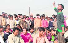 A child talks of police inaction to check crime at Dadu Majra Colony on Saturday. 