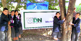 Students of Dehradun Hills Academy hug trees