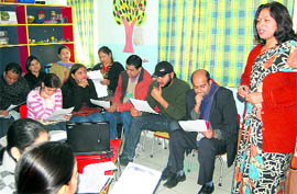 Psychologist Rashmi Wadhwa conducts a workshop on parenting at Maple Bear, a kindergarten, in Dehradun on Saturday. A Tribune photograph