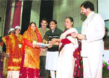 Uttarakhand Governor Margaret Alva, along with Chief Minister Ramesh Pokhriyal Nishank, gives away Nirmal Gram awards at a function in Dehradun on Saturday.
