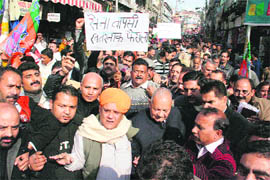 BJP activists protest against the Centres decision to withdraw troops from the valley, in Jammu on Saturday.