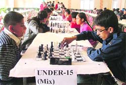 Players in action on the first day of the Ludhiana District Chess Championship being held at Janj Ghar, Model Town,