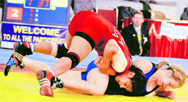 Indias Alka Tomar (red) during her match on Saturday.