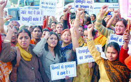 Women take part in a rally against prostitution under the banner of Youth Welfare Federation of India at Ram Lila Grounds in New Delhi on Sunday.
