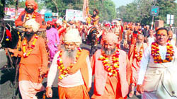 Naga saints of the Juna Akhada move towards their dera at Kankhal in Haridwar on Sunday
