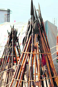 Naga saints' weapons put up outside their tents at their dera at Kankhal in Haridwar on Sunday. Tribune photo: Rameswhar Gaud
