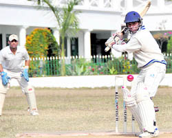 A batsman takes on a delivery during the District Cricket League in Dehradun on Sunday. A Tribune photograph 