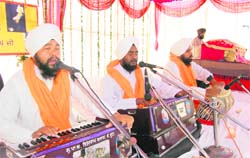 Ragis at a Mahan Gurmat Samagam at Guru Nanak Public School, Khurbura, in Dehradun on Sunday. 