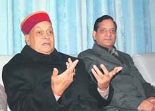 Chief Minister PK Dhumal addresses mediapersons in Dharamsala on Sunday.