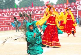 Students give a performance during the 12th annual day function of KC Public School in Jammu