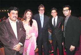 Power Pose: Maharashtra Chief Minister Ashok Chavan, Aishwarya Rai Bachchan, Amitabh Bachchan, Shah Rukh Khan and Karan Johar at the annual police show Umang 09 in Mumbai on Saturday.