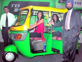 President, marketing, TVS Motor, HS Goindi (R) and vice-president, marketing, K Srinivas at the launch of TVS King ZS three-wheeler in New Delhi on Monday.