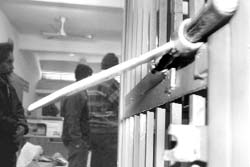 A broken lock of the safe room of Phase V post office where an unsuccessful burglary attempt took place 