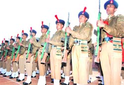 ITBP personnel present arms at their passing out parade in Chandigarh