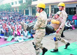 ITBP personnel during a disaster management camp at Dhudial Khalsa Senior Secondary School in Patiala