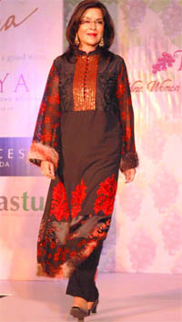 Actress Zeenat Aman walks the ramp during the launch of W-Factor Club in New Delhi on Monday.