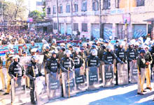 Police personnel deployed to prevent Congress workers from reaching the Assembly House;