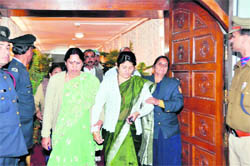 MLA Beena Maharana, who fainted during assembly session, being taken out of the House in Dehradun on Monday. 
