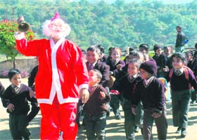 Santa Claus with students of DAV Public School, Rajpur, in Dehradun