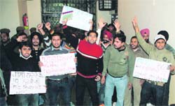 Members of the National Secular Forum protest in front of the Vice-Chancellors offfice at Jammu University