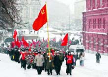 A column of Russian Communists marches towards the tomb of Joseph Stalin at the Red Square to mark his 130th birth anniversary in Moscow on Monday. His grandson Yevgeny Dzhugashvili is suing a Moscow radio station for dishonouring the dictator.