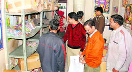 Police officials raid a shop in Sector 22, Chandigarh, on Tuesday.