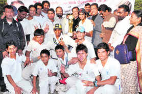 The Dehradun team that won the Winter Cricket Festival in Dehradun on Tuesday.
