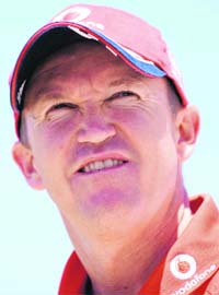 Englands cricket coach Andy Flower gestures during a press conference