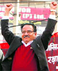 Maoist leader Pushpa Kamal Dahal gestures during a protest rally on the last day of the three-day strike in Kathmandu on Tuesday