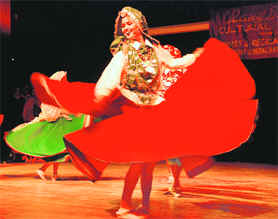 Women perform at a cultural function organised by the Sports and Recreation Club at Tagore Theatre in Chandigarh on Wednesday.