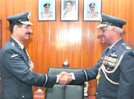Air Commodore Rajeev Sachdeva (left) takes over as Air Officer Commanding 12 Wing from Air Commodore SRK Nair (right) in Chandigarh on Wednesday.