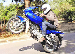 A biker performs stunts in front of Government Museum, Sector 10, Chandigarh.