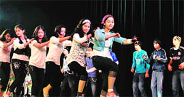 Students give a performance during the annual day function of St Xavier Convent School at Zorawar Singh Auditorium in Jammu on Wednesday