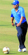The master has a ball: Sachin Tendulkar plays football during a training session at the Eden Gardens in Kolkata on Wednesday
